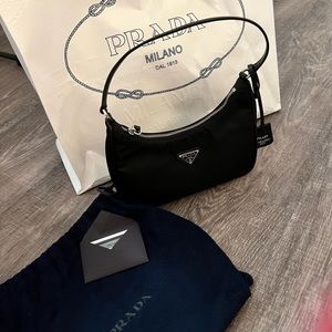 With dust bag, receipt, and original shopping bag